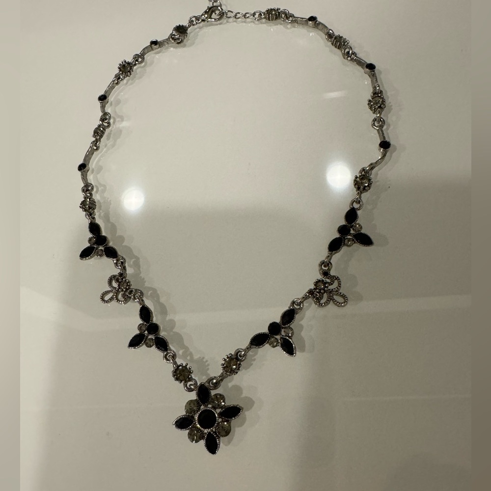 Silver necklace with black and silver stones